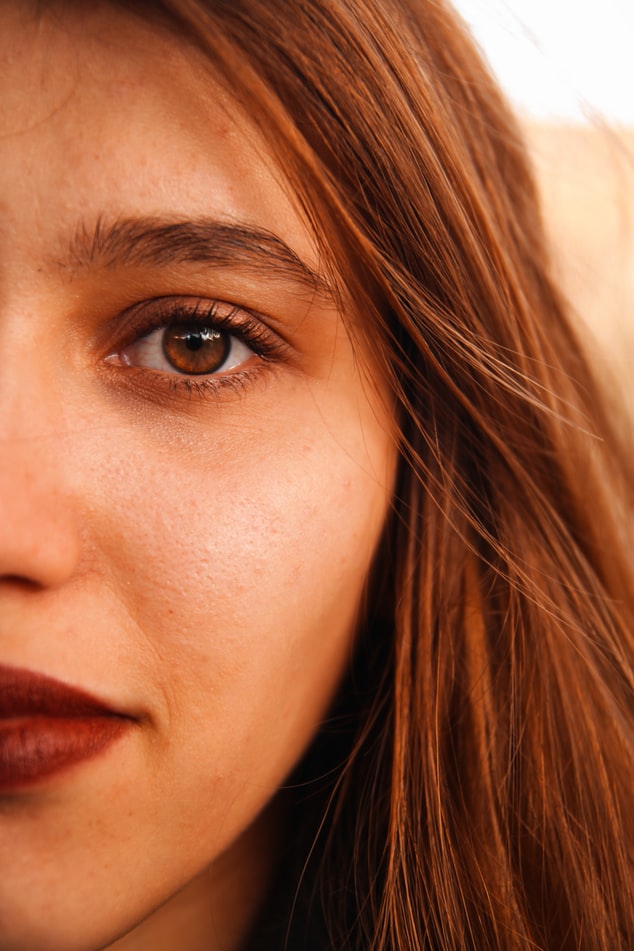 Close up of woman's face with clear skin