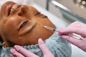 Woman receiving Botox injections.